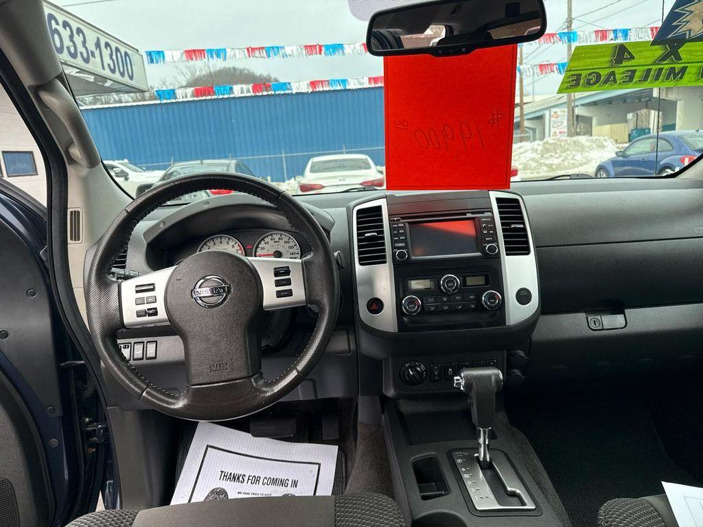 used 2015 Nissan Frontier car, priced at $19,900