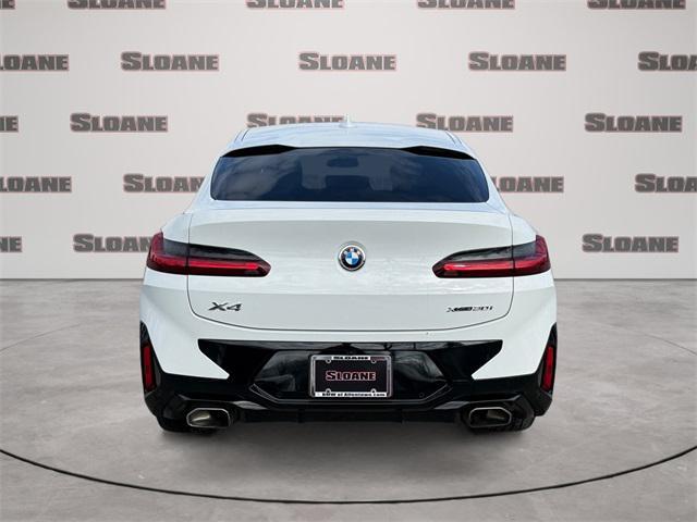 used 2022 BMW X4 car, priced at $37,192