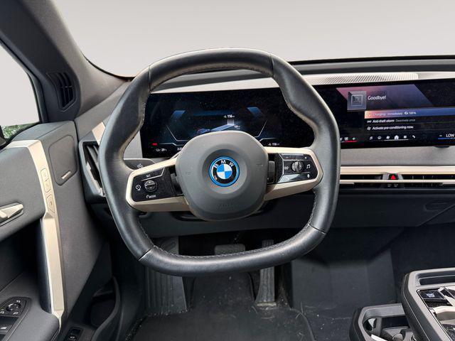 used 2024 BMW iX car, priced at $54,971