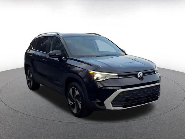 used 2025 Volkswagen Taos car, priced at $23,180