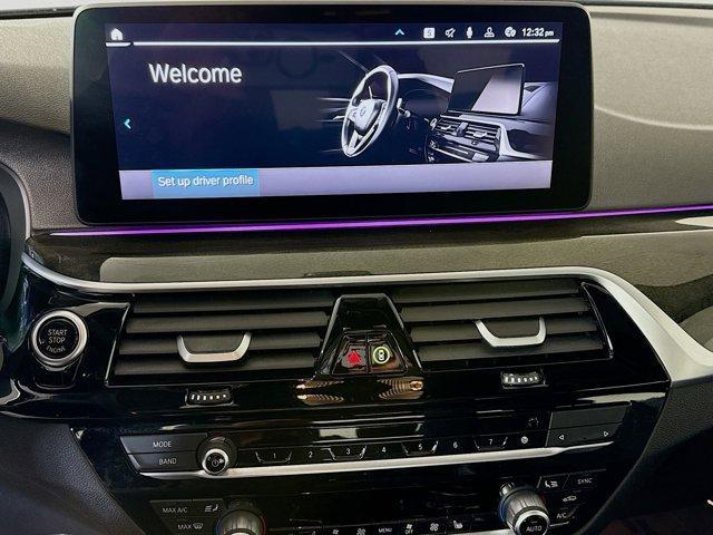 used 2023 BMW 530e car, priced at $34,998