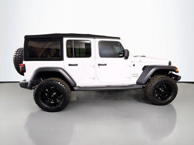 used 2021 Jeep Wrangler Unlimited car, priced at $24,498