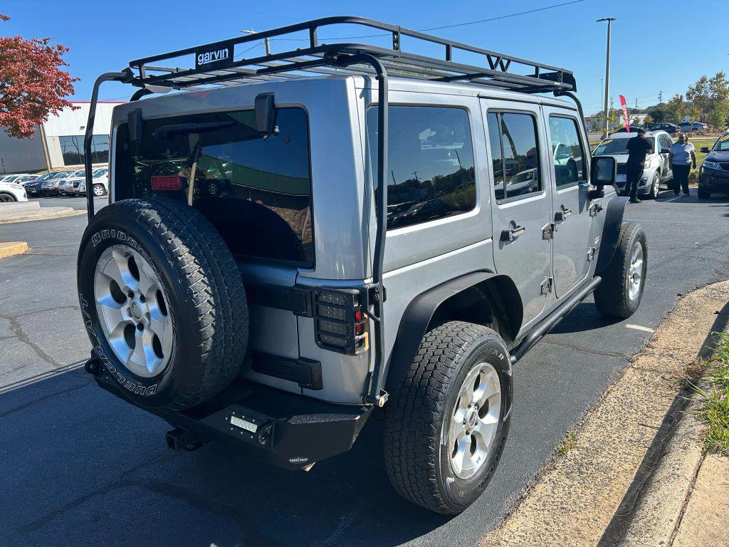used 2014 Jeep Wrangler Unlimited car, priced at $13,695