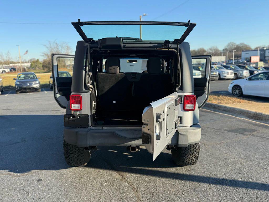 used 2015 Jeep Wrangler car, priced at $14,295