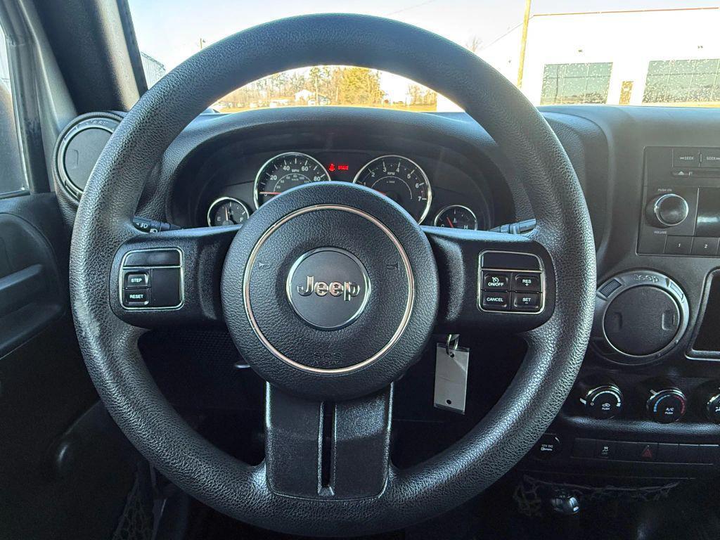 used 2015 Jeep Wrangler car, priced at $14,295