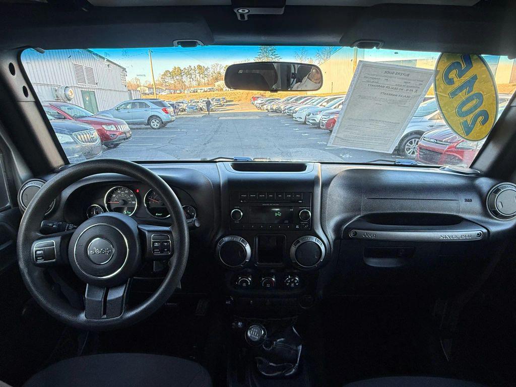 used 2015 Jeep Wrangler car, priced at $14,295