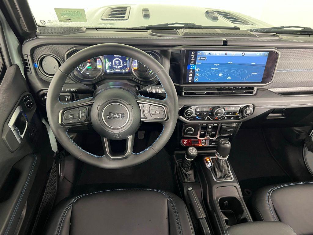 used 2024 Jeep Wrangler 4xe car, priced at $41,673