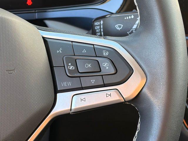 used 2024 Volkswagen Taos car, priced at $25,373