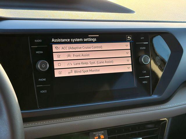used 2024 Volkswagen Taos car, priced at $25,373