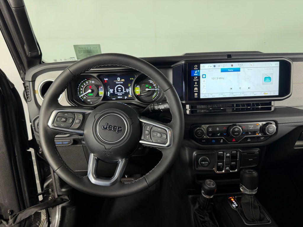 used 2025 Jeep Wrangler 4xe car, priced at $31,473