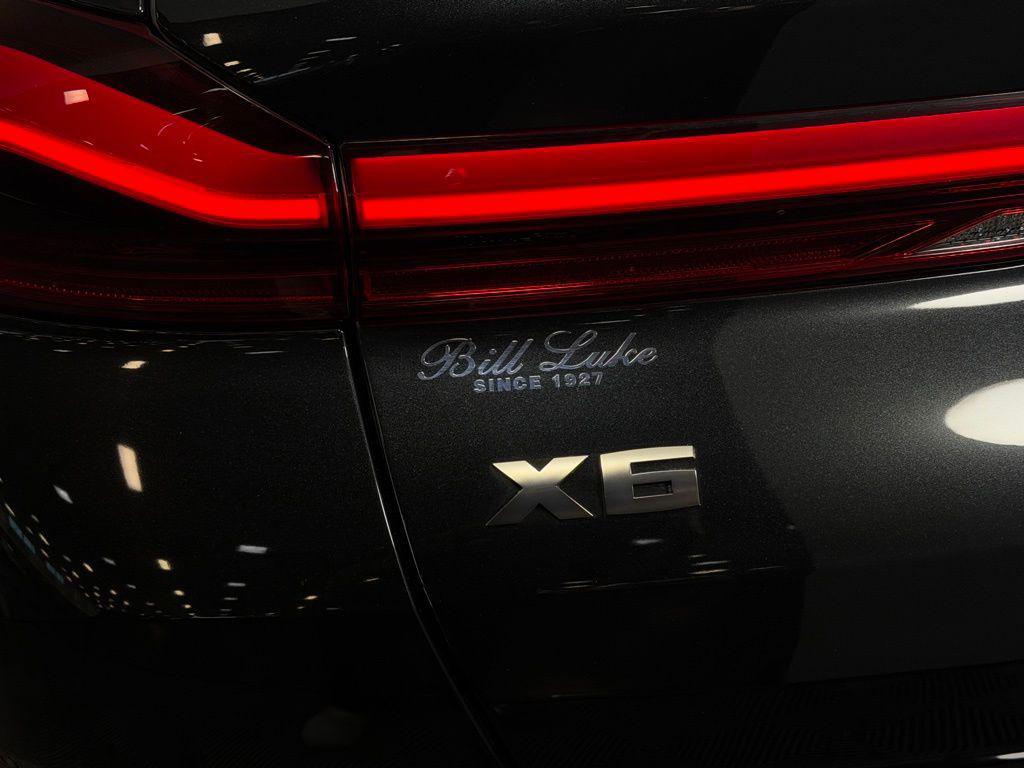 used 2023 BMW X6 car, priced at $60,373