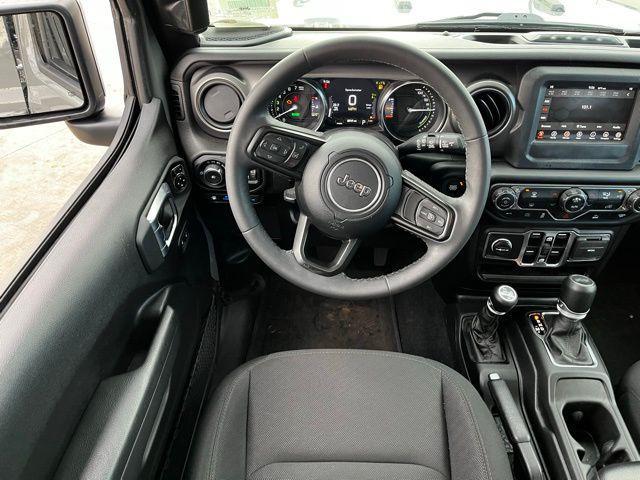 used 2023 Jeep Wrangler 4xe car, priced at $27,473