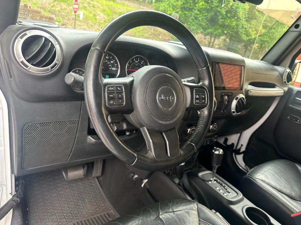 used 2016 Jeep Wrangler Unlimited car, priced at $16,995