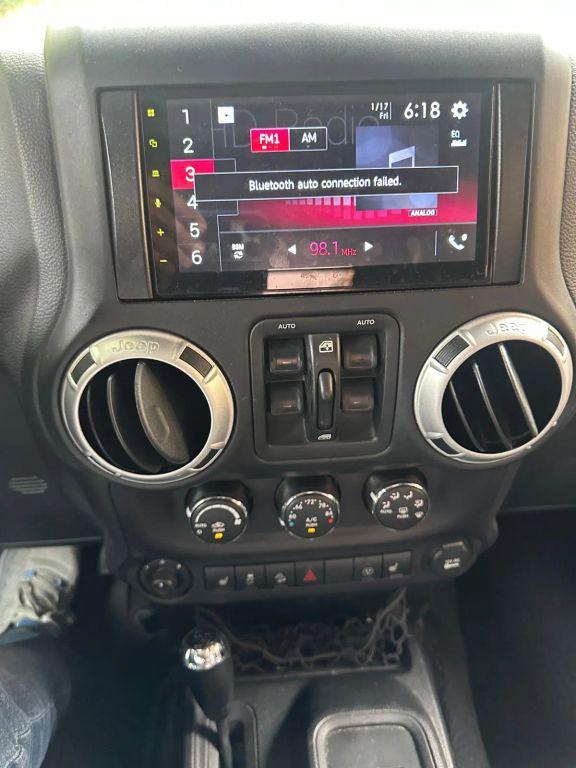 used 2016 Jeep Wrangler Unlimited car, priced at $16,995