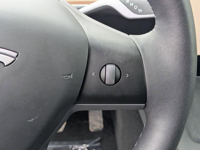 used 2025 Tesla Model Y car, priced at $33,819