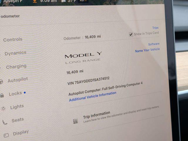 used 2025 Tesla Model Y car, priced at $33,819