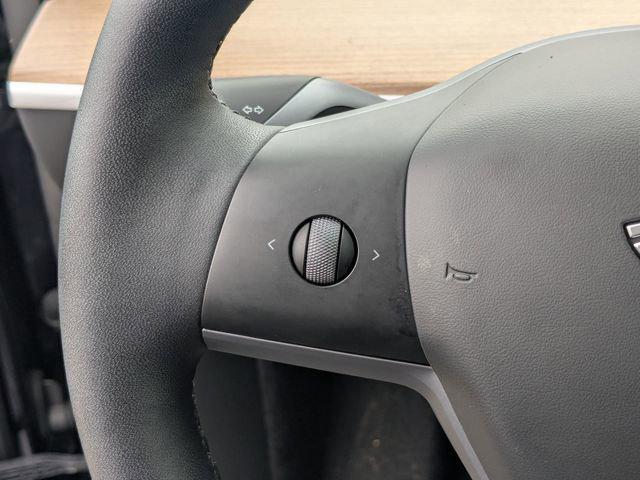 used 2025 Tesla Model Y car, priced at $33,819