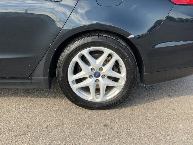 used 2014 Ford Fusion car, priced at $7,999