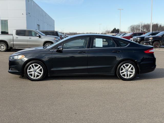 used 2014 Ford Fusion car, priced at $7,999