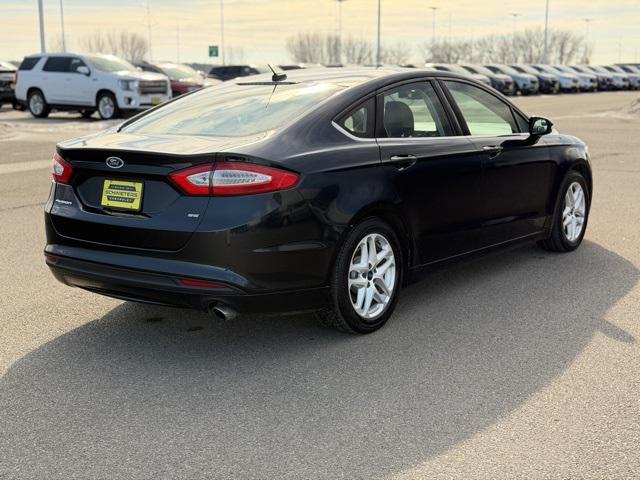 used 2014 Ford Fusion car, priced at $7,999