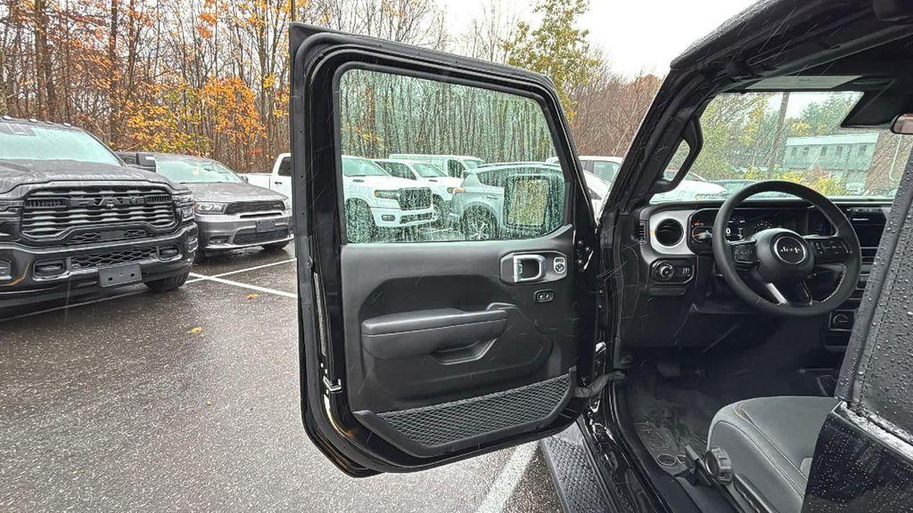 used 2025 Jeep Wrangler car, priced at $34,977