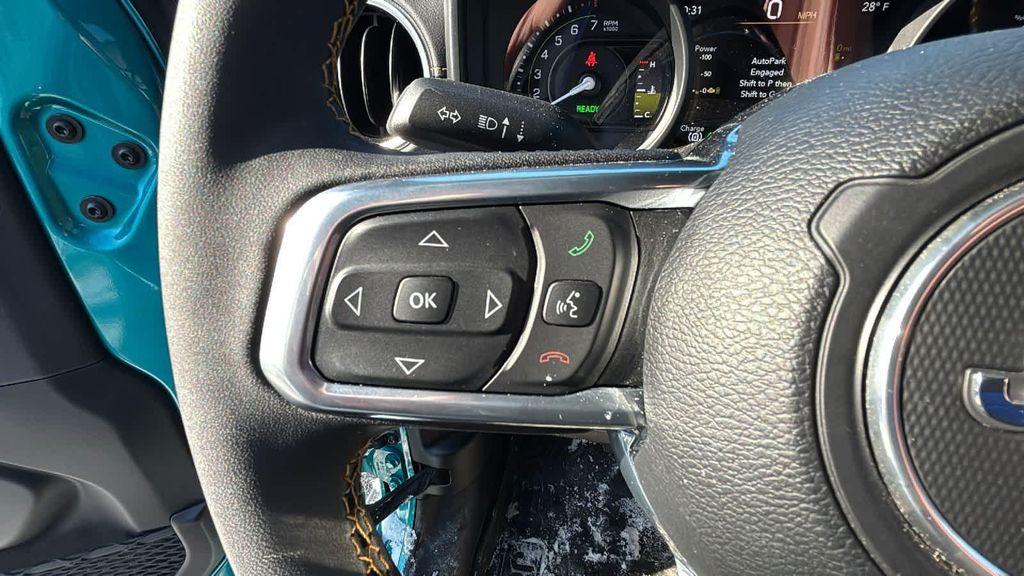 used 2024 Jeep Wrangler 4xe car, priced at $36,428