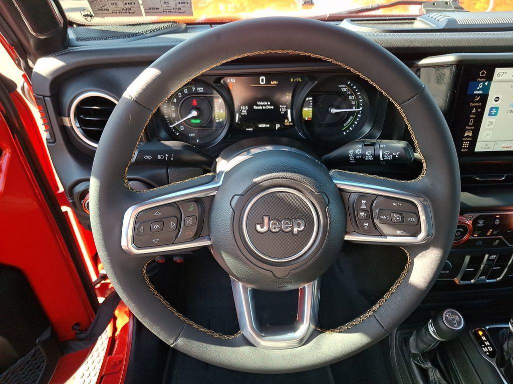 used 2024 Jeep Wrangler 4xe car, priced at $34,178