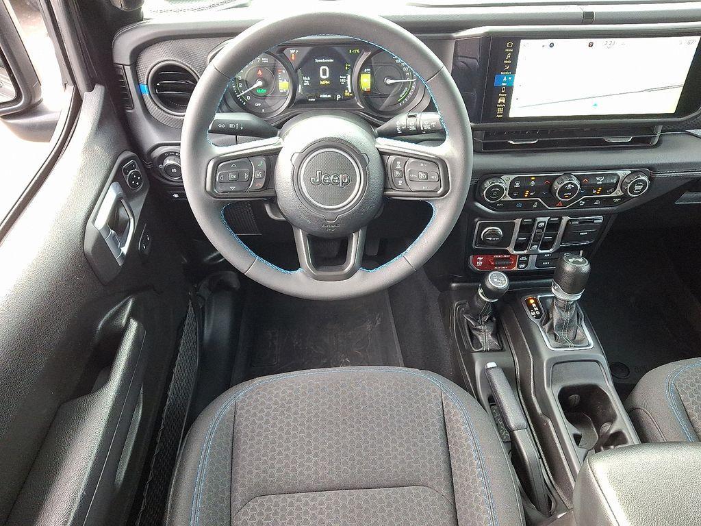 used 2024 Jeep Wrangler 4xe car, priced at $29,980