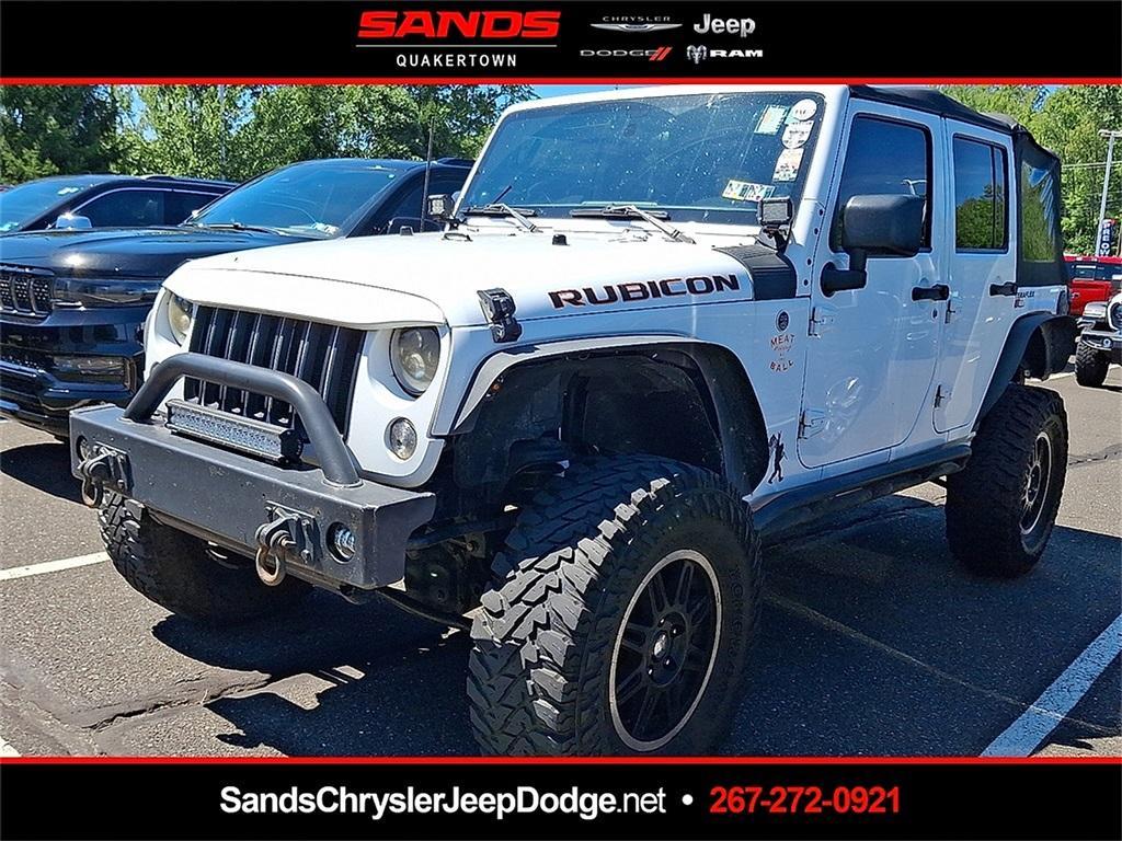 used 2011 Jeep Wrangler Unlimited car, priced at $11,990