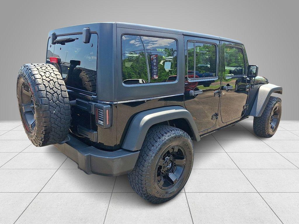 used 2017 Jeep Wrangler Unlimited car, priced at $19,453