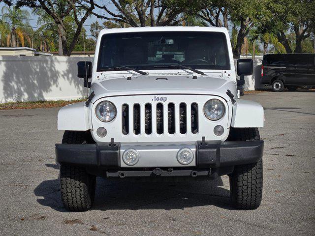 used 2015 Jeep Wrangler Unlimited car, priced at $13,991