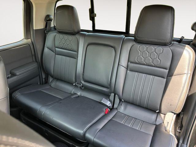 used 2024 Nissan Frontier car, priced at $32,994