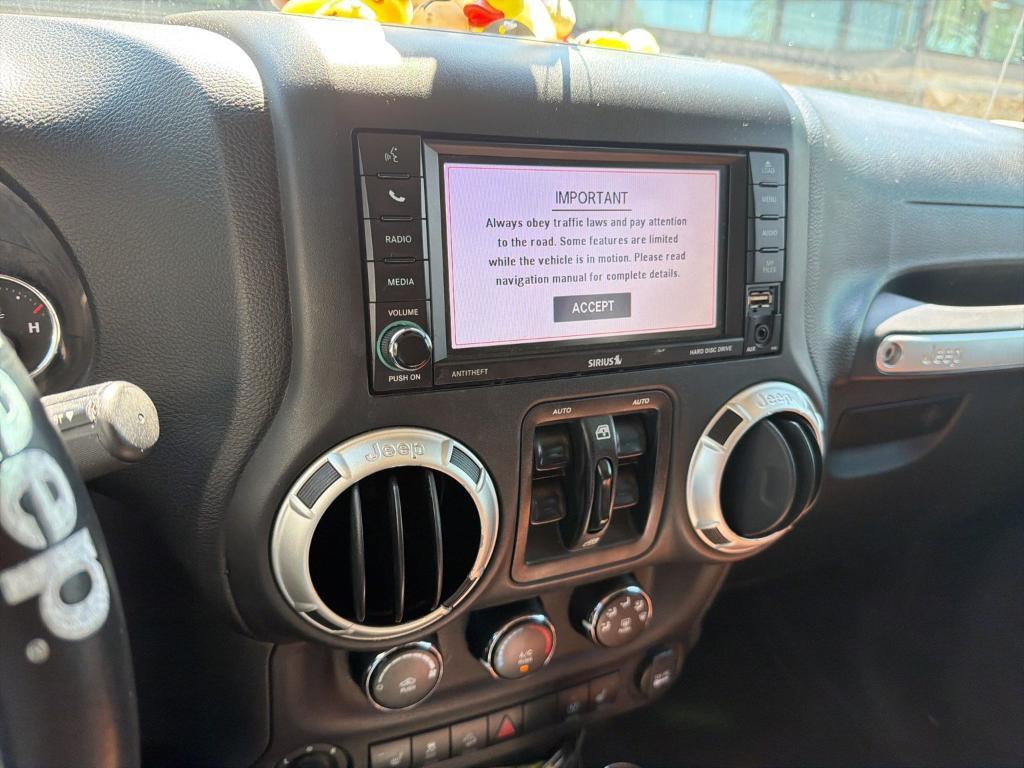 used 2018 Jeep Wrangler JK Unlimited car, priced at $22,784