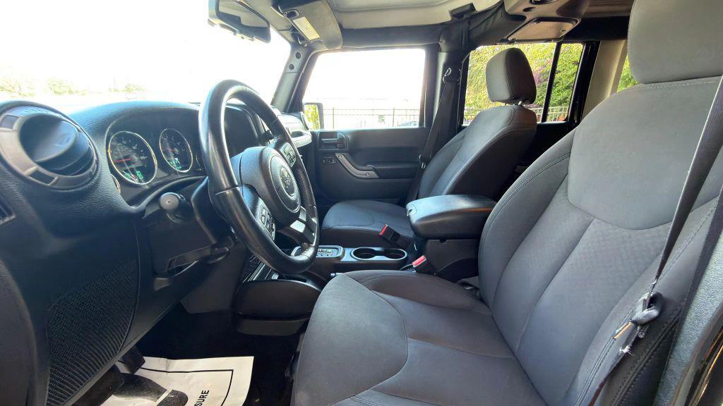 used 2018 Jeep Wrangler JK Unlimited car, priced at $26,998