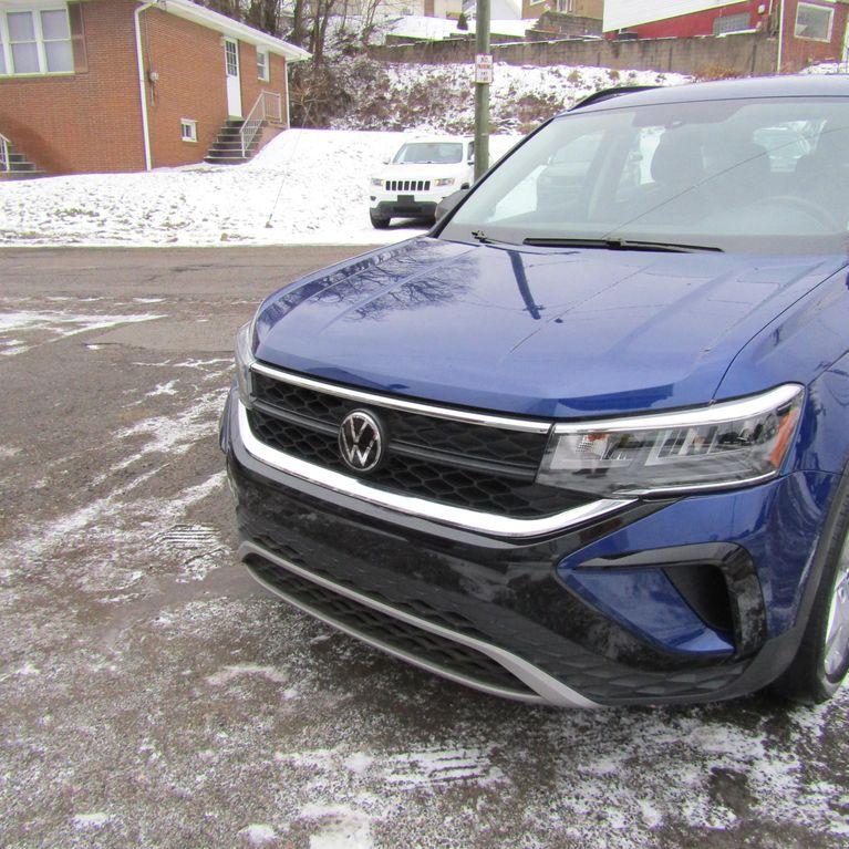 used 2023 Volkswagen Taos car, priced at $18,998