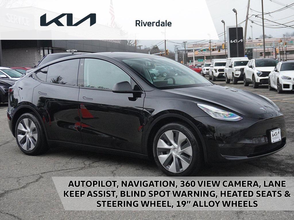 used 2021 Tesla Model Y car, priced at $27,379