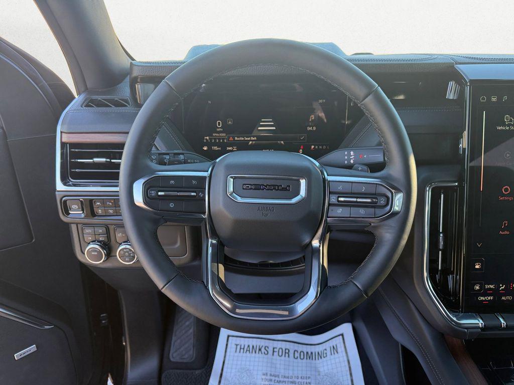 used 2025 GMC Yukon car, priced at $69,072