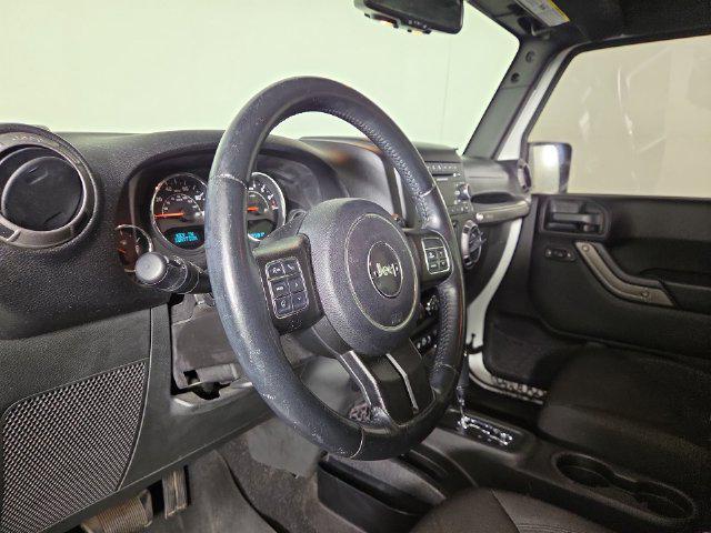 used 2015 Jeep Wrangler Unlimited car, priced at $17,945