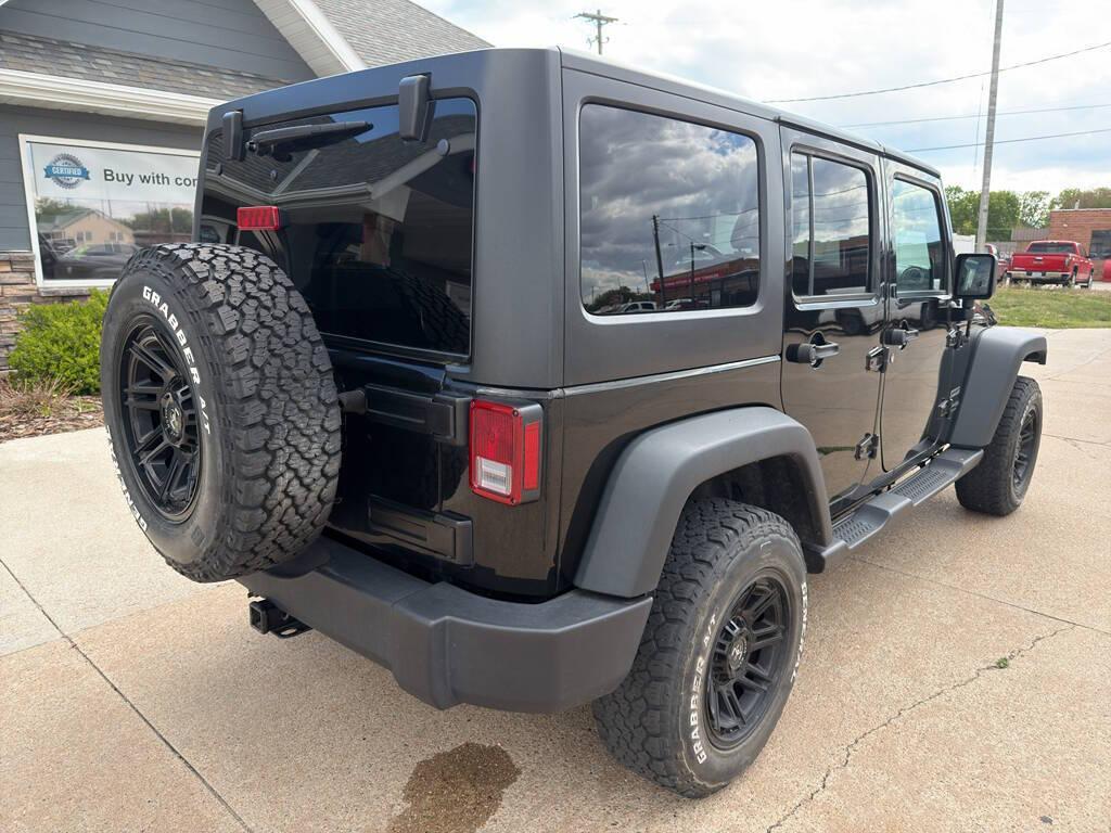 used 2018 Jeep Wrangler JK Unlimited car, priced at $24,988