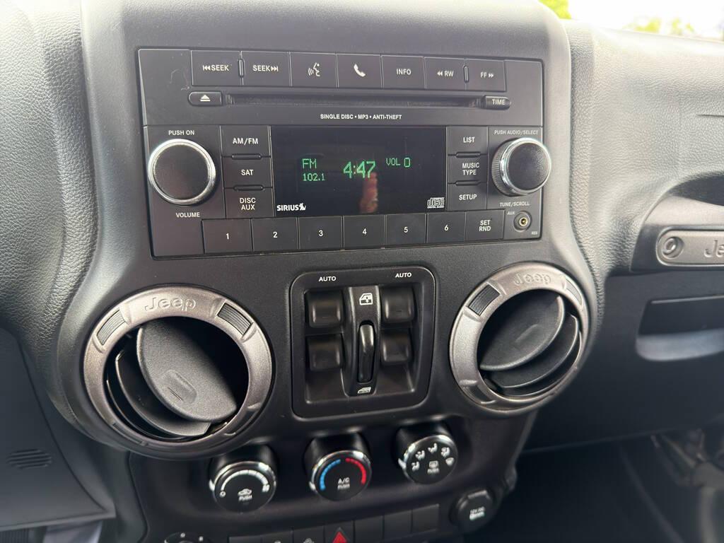 used 2018 Jeep Wrangler JK Unlimited car, priced at $24,988
