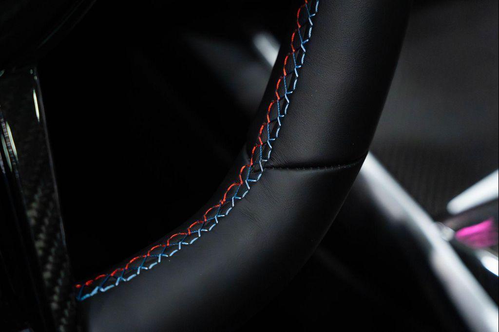 used 2025 BMW M4 car, priced at $86,990