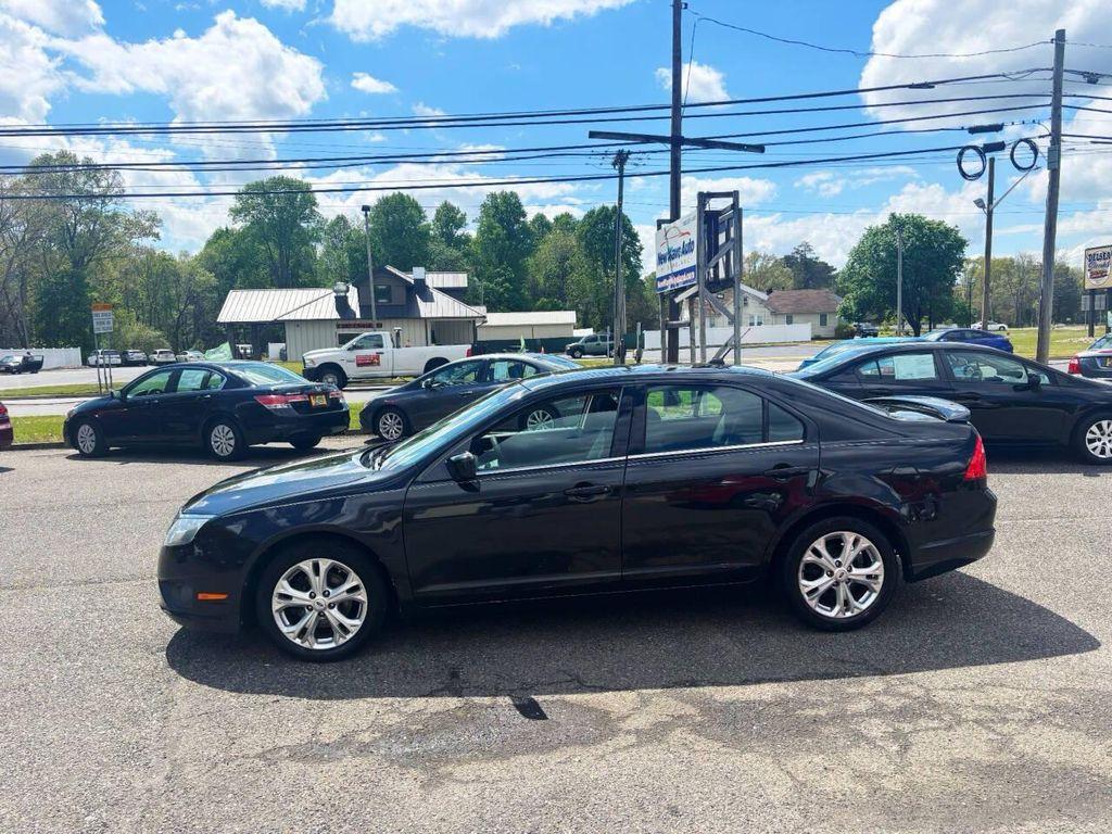 used 2012 Ford Fusion car, priced at $5,995