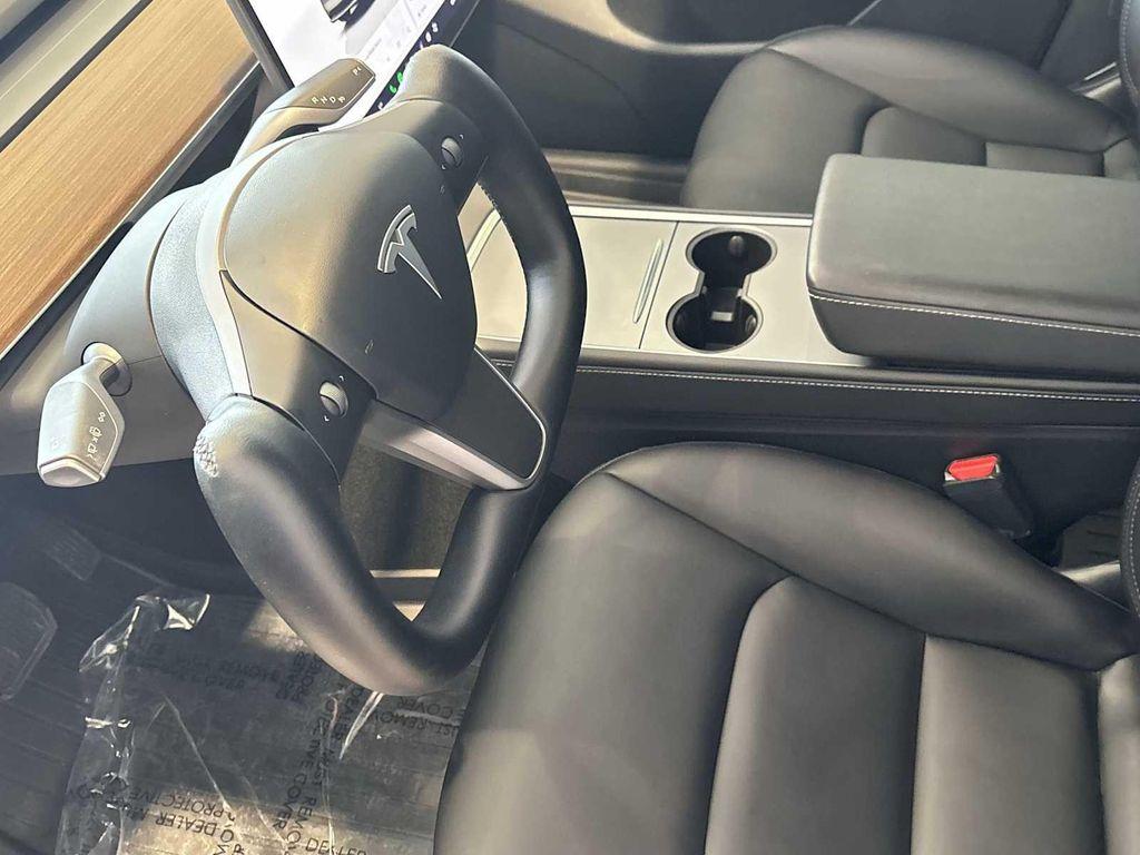 used 2024 Tesla Model Y car, priced at $34,428
