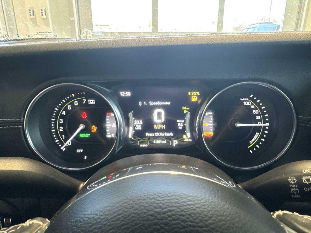 used 2023 Jeep Wrangler 4xe car, priced at $27,856