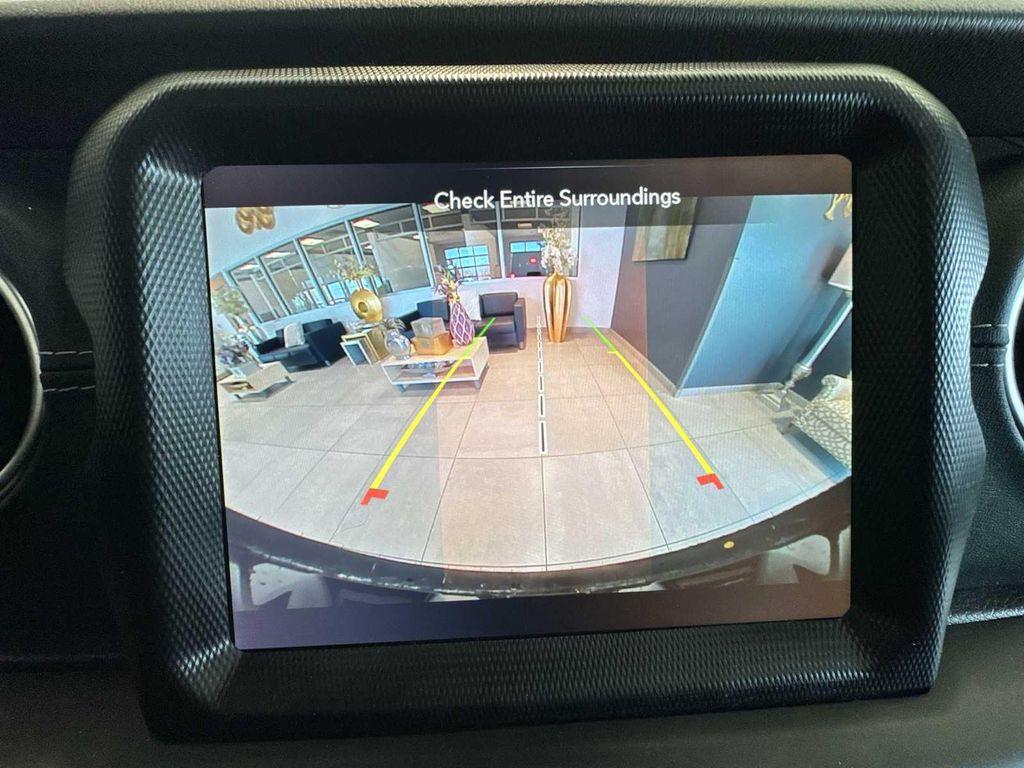 used 2023 Jeep Wrangler 4xe car, priced at $27,856