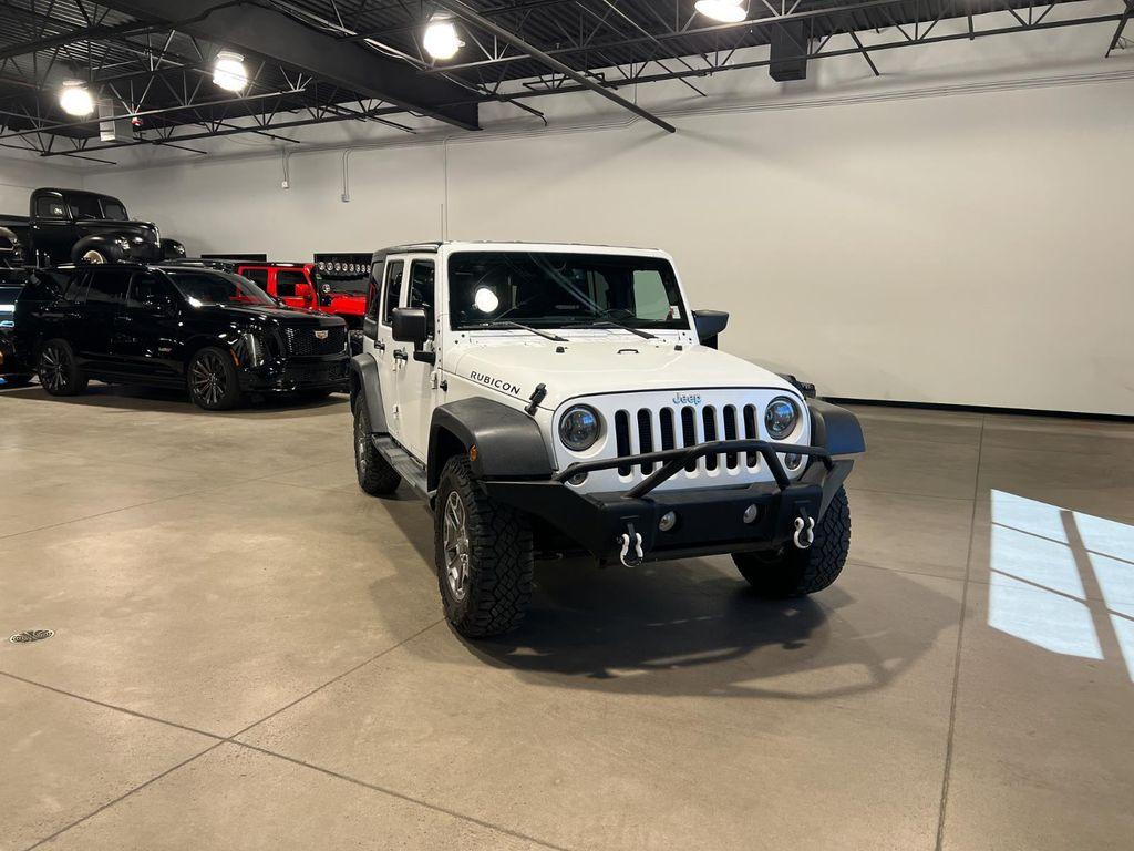 used 2014 Jeep Wrangler Unlimited car, priced at $16,995