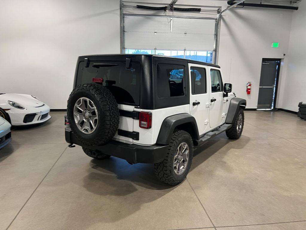 used 2014 Jeep Wrangler Unlimited car, priced at $16,995