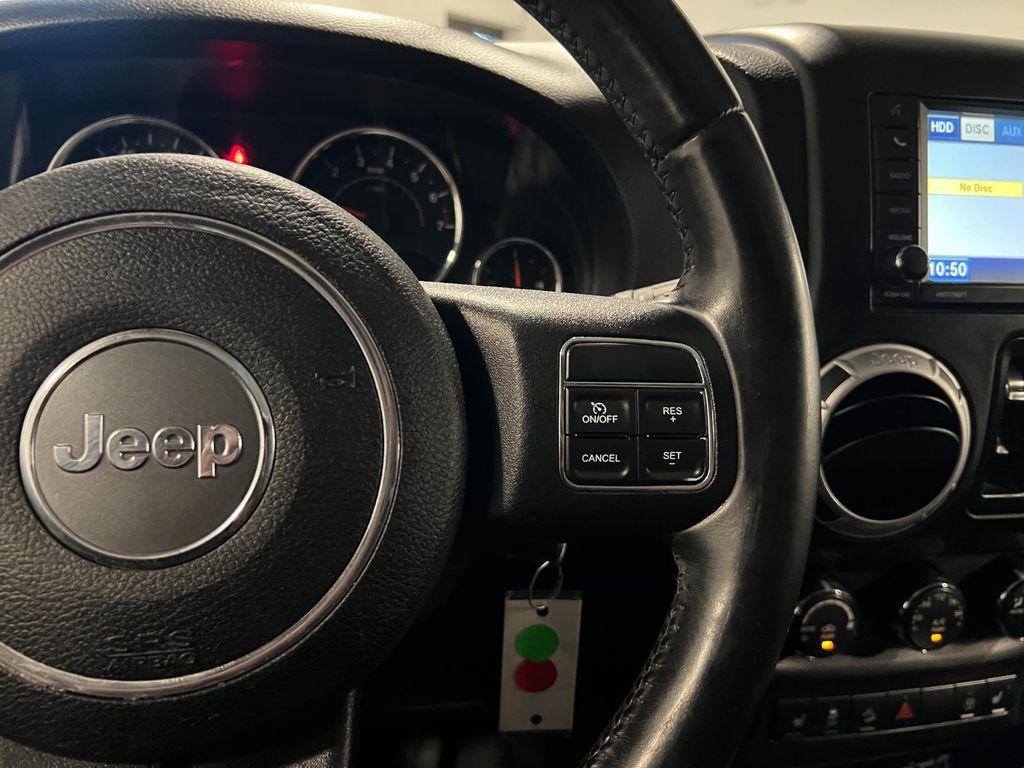 used 2014 Jeep Wrangler Unlimited car, priced at $16,995