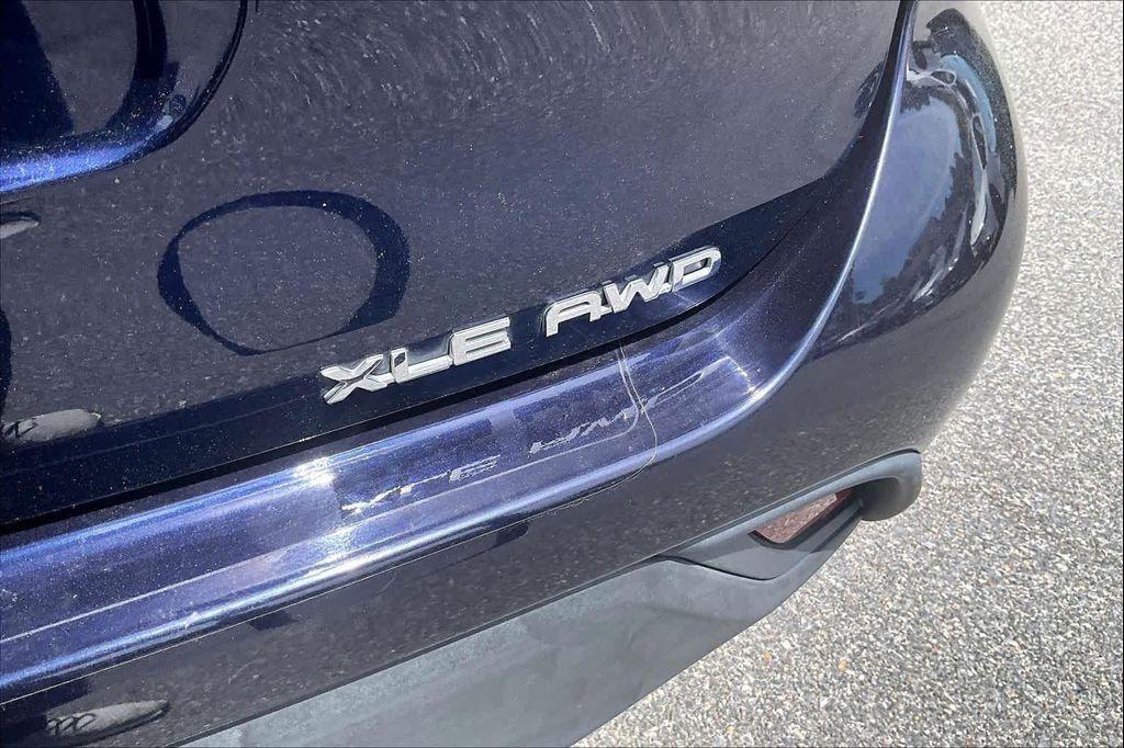 used 2021 Toyota Highlander car, priced at $29,299