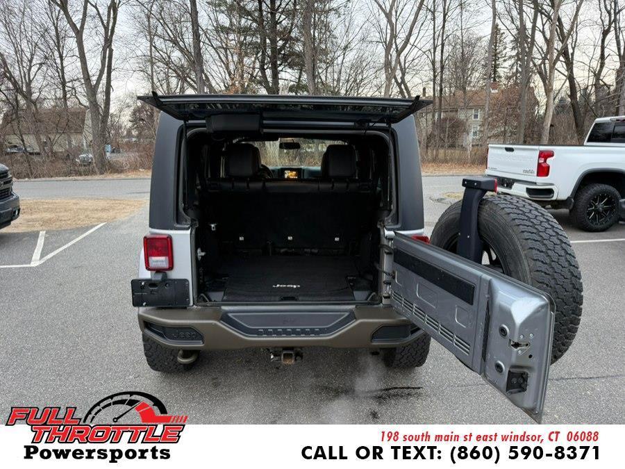 used 2016 Jeep Wrangler Unlimited car, priced at $9,999